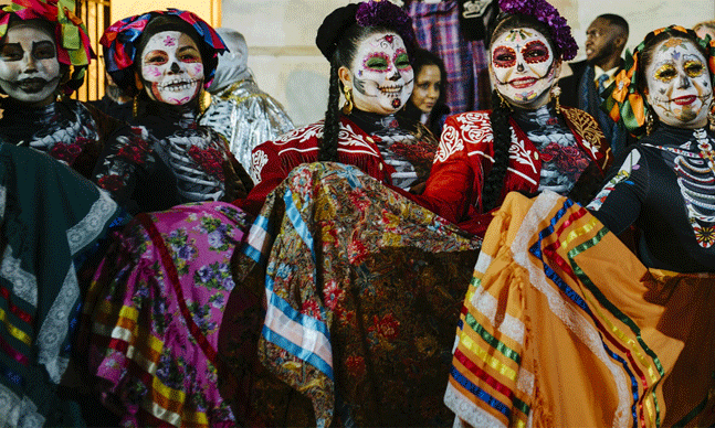 Dancers in front of Smithsonian’s National Portrait Gallery for Dia de los  Muertos festival.